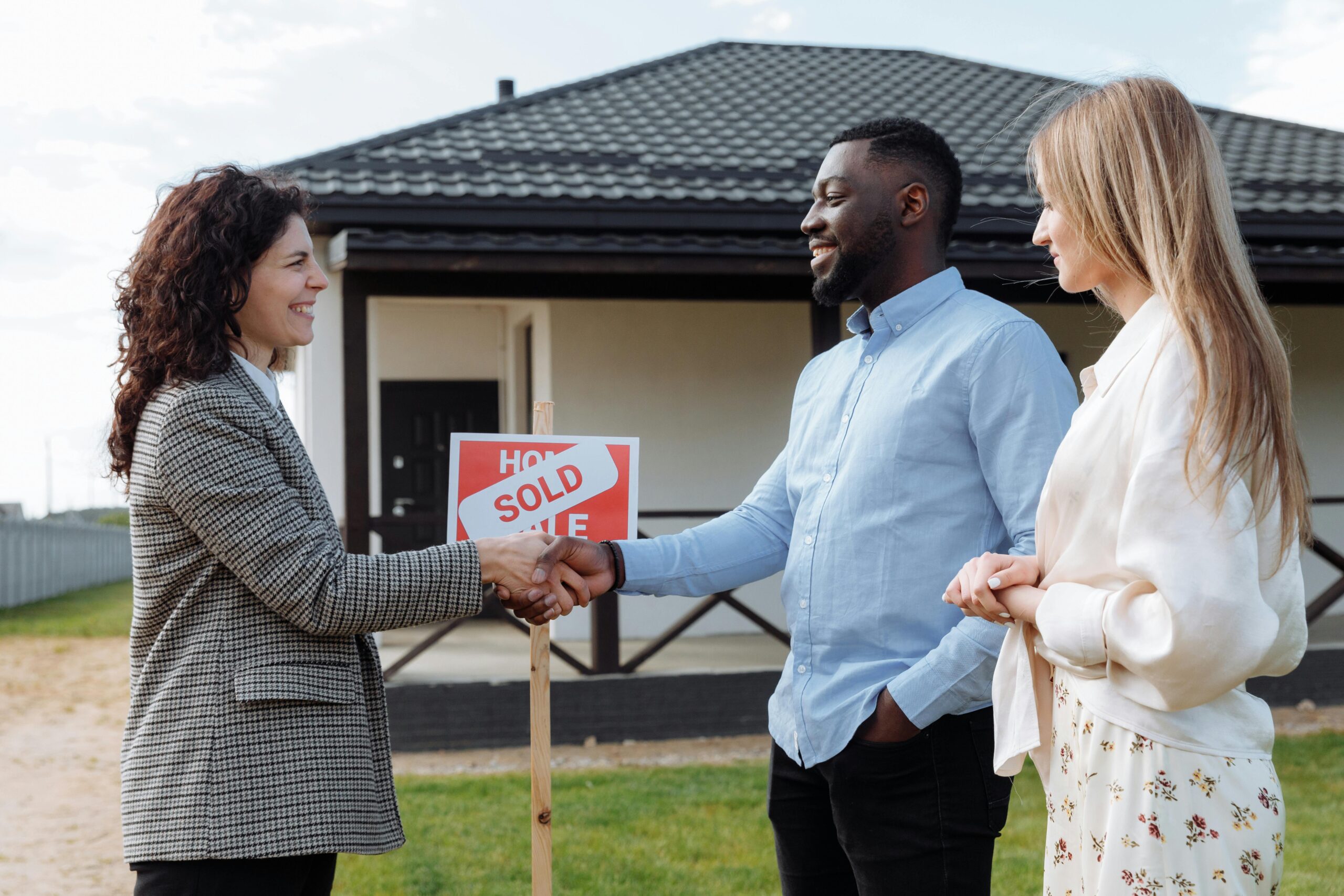 People Buying First Home Shaking Hands